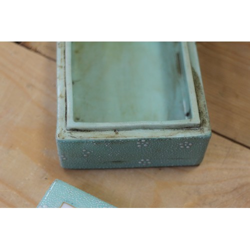 109 - A Chinese porcelain box and cover with verse and textured light green glaze, 4 3/4