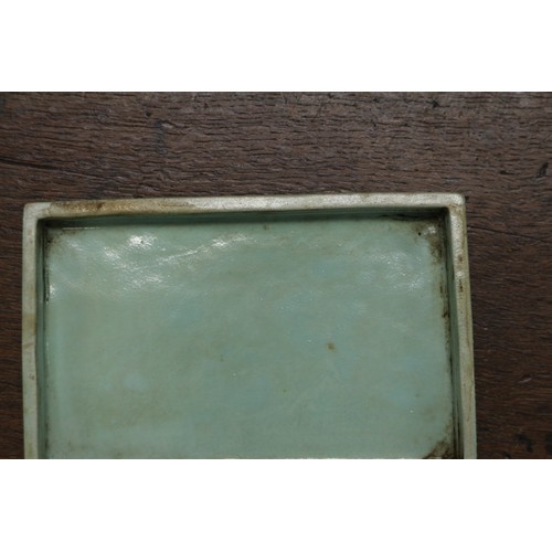 109 - A Chinese porcelain box and cover with verse and textured light green glaze, 4 3/4