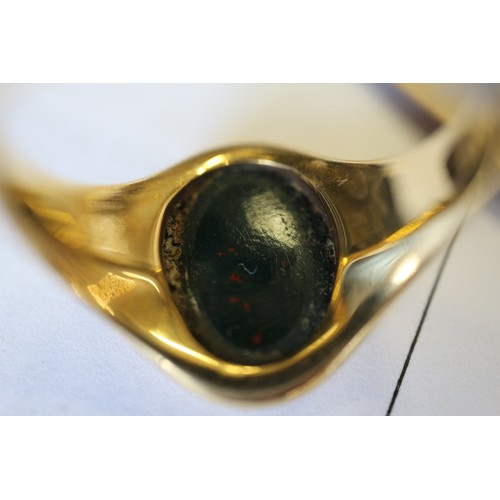 348 - An 18ct gold signet ring with engraved bloodstone intaglio, size O, 6.9g overall