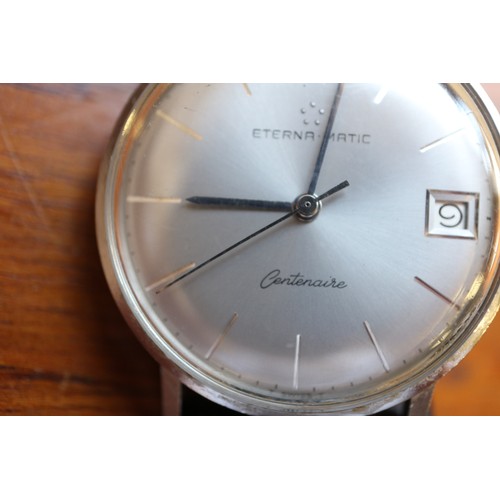 336 - A gentleman's 1960s Eterna-Matic wristwatch with silvered dial, baton numerals and date aperture, an... 