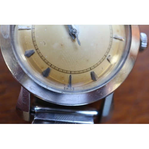 336 - A gentleman's 1960s Eterna-Matic wristwatch with silvered dial, baton numerals and date aperture, an... 