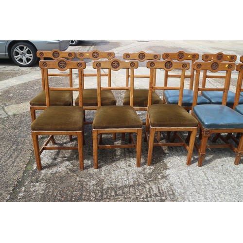 519 - A matched set of twelve mid Victorian carved oak  bar back dining chairs designed by AWN Pugin and m... 