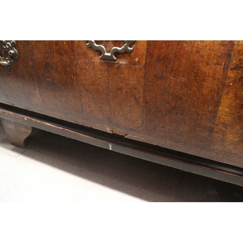 515 - An early 18th century figured walnut and inlaid chest of two short and three long drawers, on bracke... 