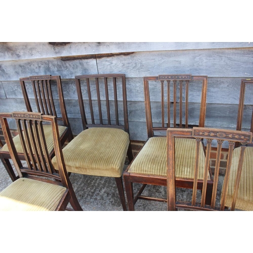574 - A Harlequin set of six Georgian mahogany standard dining chairs with vertical rail backs, upholstere... 