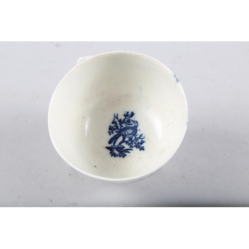 7 - A late 18th century Caughley blue and white bird decorated tea bowl, a Coalport style candlestick sn... 