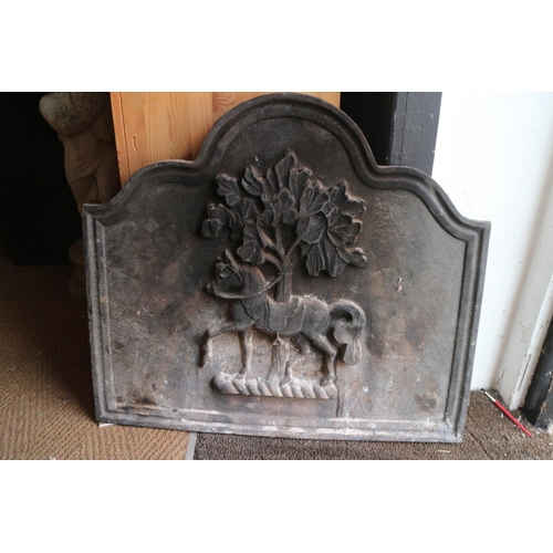 755 - A cast-iron fireback, horse and tree design, 29