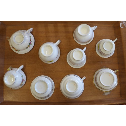 26 - A selection of 19th century English floral decorated cabinet cups and saucers