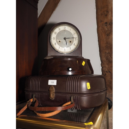 133 - A Telefunken portable record player in Bakelite case, a similar wall clock and a mantel clock
