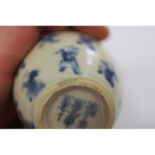 99 - A Chinese blue and white figure decorated oviform vase with six-character mark, 2 3/4