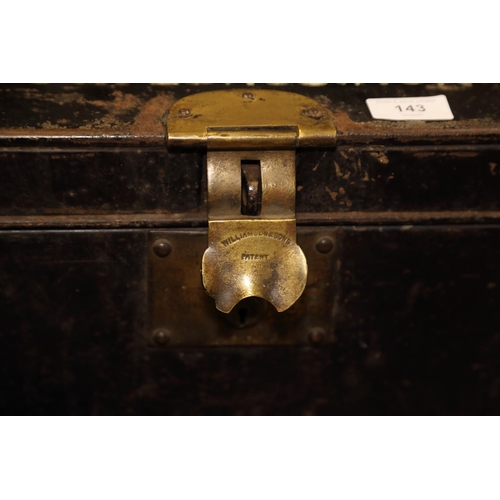 148 - A black metal military trunk with brass 