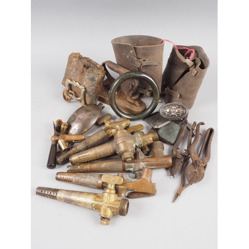 150 - Six brass beer taps, a pair of WWII leather gaiters, a cow bell, other metalware and a pair of chrom... 