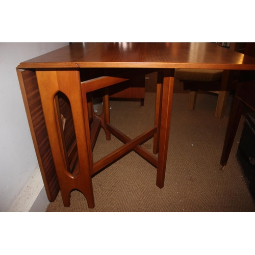 585 - A retro teak drop leaf table, 66