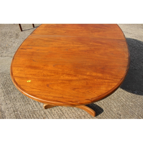 592 - A G-Plan teak oval dining table, 64