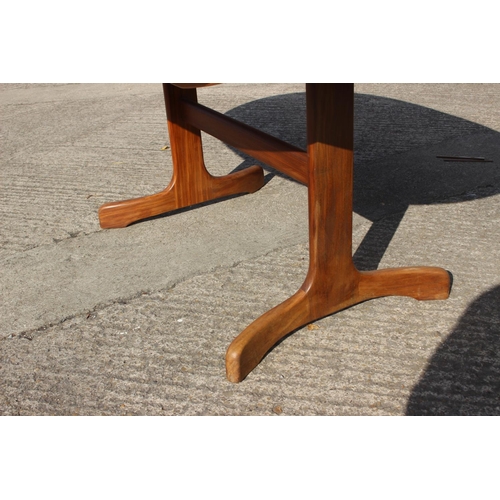 592 - A G-Plan teak oval dining table, 64