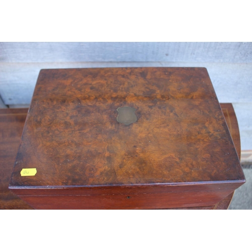 172 - A burr walnut sewing box, containing sewing supplies, including a darning dolly, thread, needles etc... 