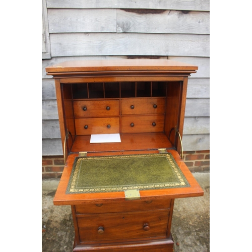 532 - A gentleman's 19th century fall front desk, the interior fitted drawers and pigeonholes with tooled ... 