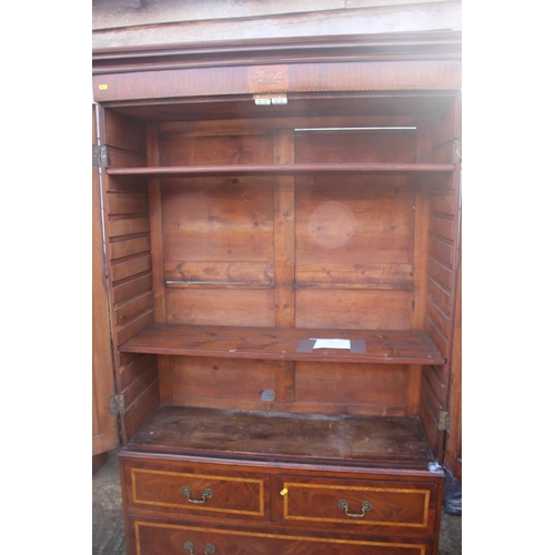 533 - A Georgian figured mahogany and satinwood banded bookcase enclosed two doors over two short and one ... 