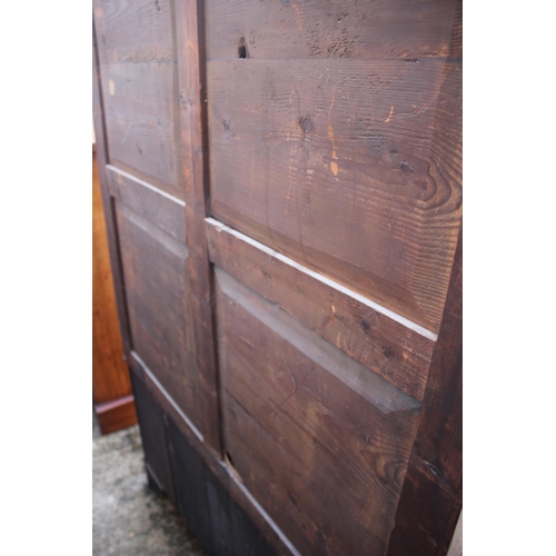 533 - A Georgian figured mahogany and satinwood banded bookcase enclosed two doors over two short and one ... 