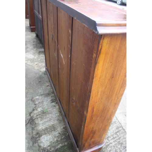 534 - A Victorian figured walnut open bookcase, fitted adjustable shelves, on block base, 56