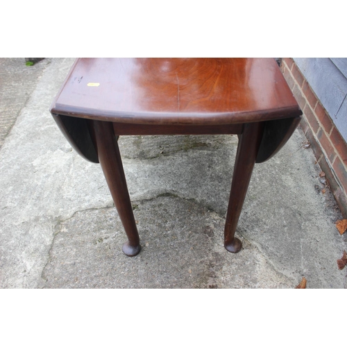 535 - A George III padouk oval drop leaf table, on turned supports and pad feet, 52