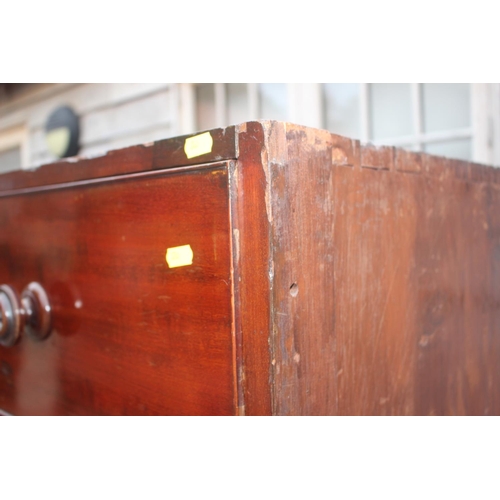 544 - A 19th century mahogany chest of five long graduated drawers with knob handles, 42