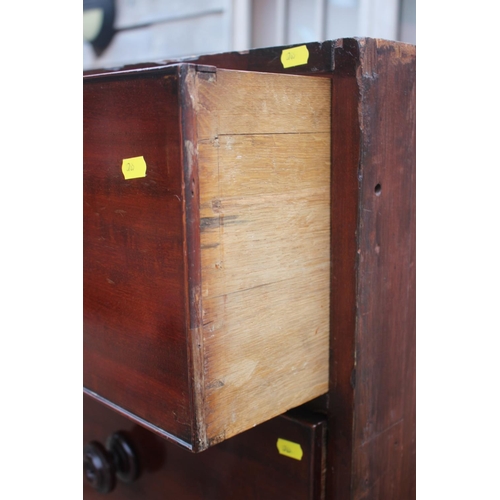 544 - A 19th century mahogany chest of five long graduated drawers with knob handles, 42