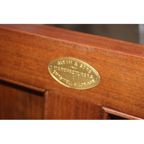 545 - A 19th century walnut and ebonised bookcase with glazed upper section enclosed two doors over two dr... 