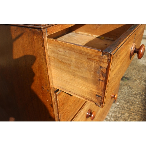 549 - A 19th century mahogany chest of two short and three long drawers with knob handles, on bracket feet... 