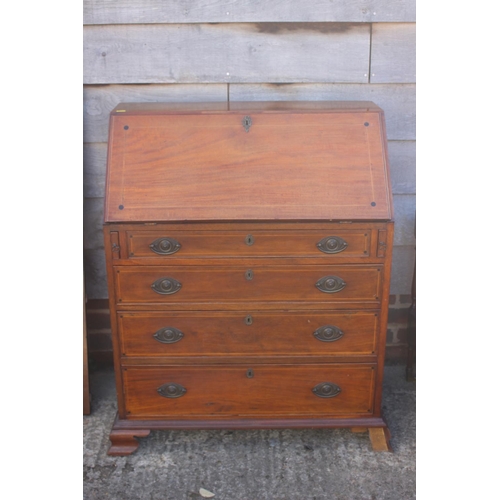608 - A mahogany and box line inlaid fall front bureau with fitted writing compartment over four long draw... 