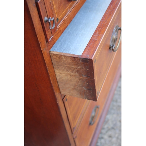 608 - A mahogany and box line inlaid fall front bureau with fitted writing compartment over four long draw... 