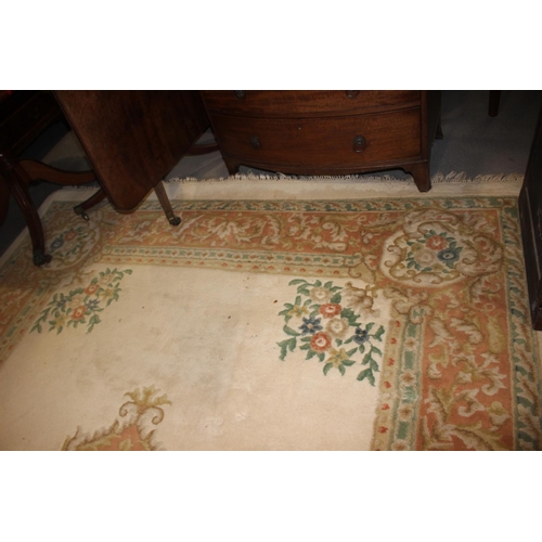 666 - An Indian wool contour pile carpet of Aubusson design, on a cream ground, 141