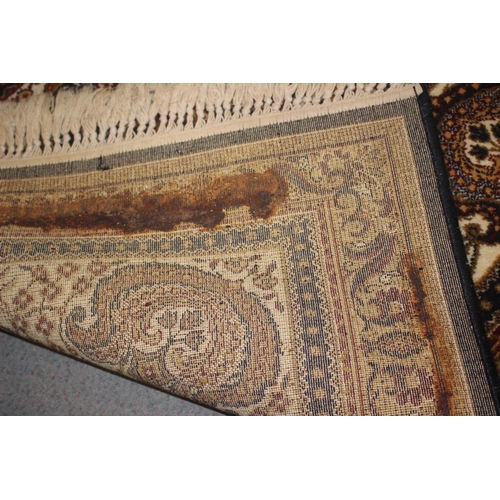 670 - A Persian garden style carpet, in shades of blue, brown, fawn, green and natural, 144