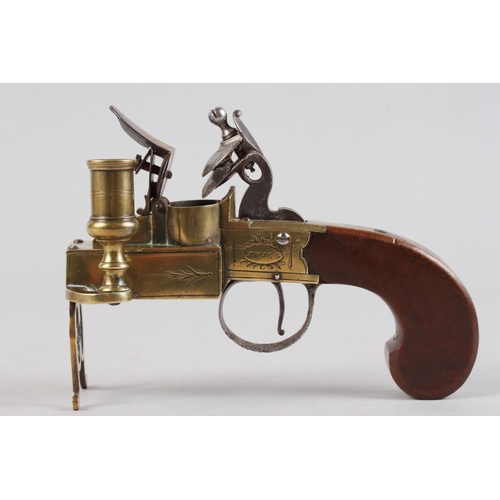 194 - A late 18th century brass box lock tinder pistol and chamberstick, by Trigg London, walnut stock, 6 ... 