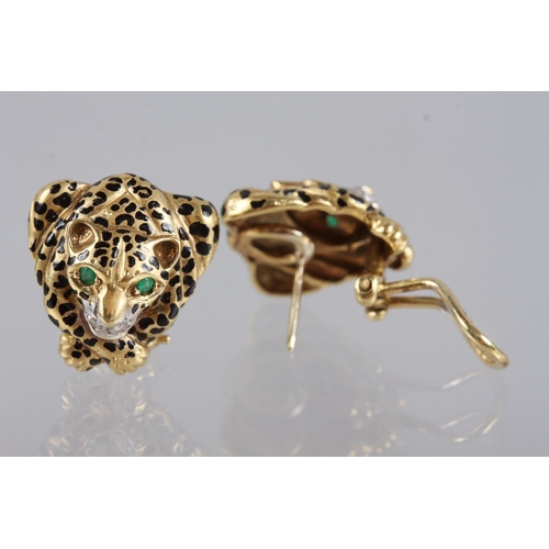 327 - A pair of yellow metal earrings, formed as crouching leopards, set emeralds, diamonds and black enam... 