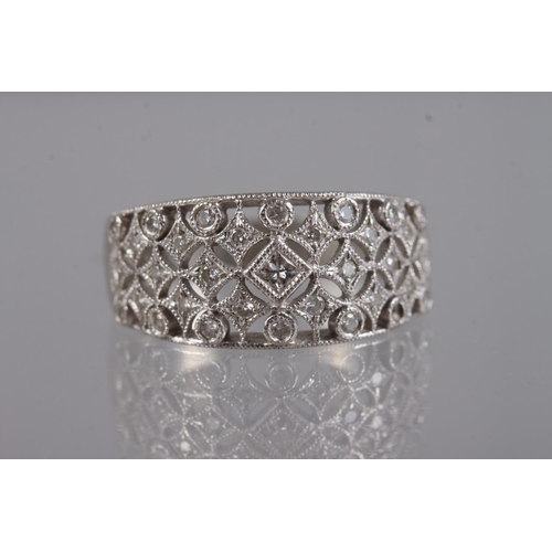 329 - An Art Deco platinum and diamond dress ring size Q, 8.2g