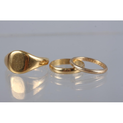 383 - An 18ct gold signet ring, size U, 7.3g, an 18ct gold wedding band, size K, 2.1g, and a yellow metal ... 