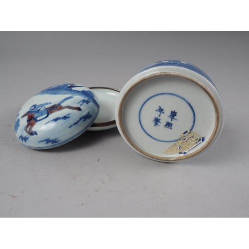 101 - A Chinese blue, white and iron oxide porcelain brush washer, decorated figures in a landscape with c... 