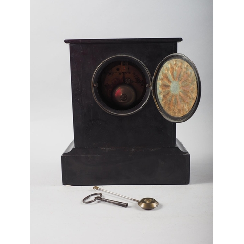 129 - A black marble and slate mantel clock, by W H Skinner and F White, with white enamel dial and Roman ... 