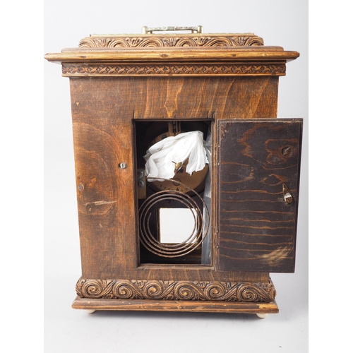 132 - A French mantel clock in polished as walnut and brass mounted case with eight-day movement, 13 1/2