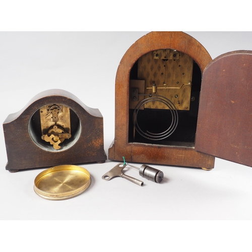 135 - An Edwardian mahogany, box and ebony strung arch top mantel clock with eight-day movement, 10