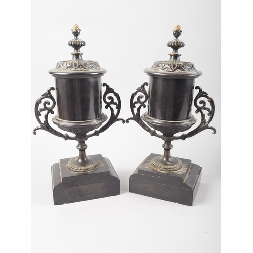 149 - A pair of late 19th century gilt metal mounted two-handled vases, on marble bases, 12