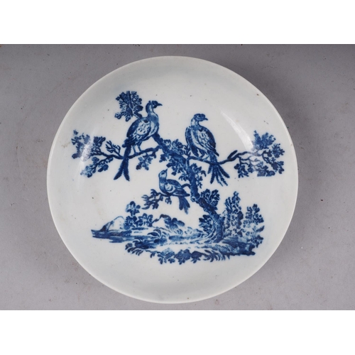 18 - An 18th century Worcester blue and white saucer, decorated birds in a tree, 5