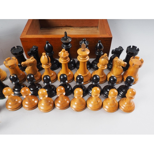 183 - A boxwood and ebony Staunton pattern chess set, the king 3 1/4