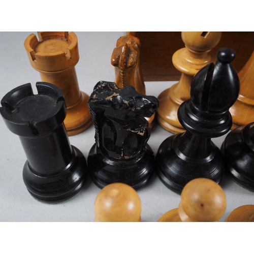 186 - A boxwood and ebony Staunton pattern chess set, the king 3