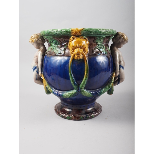 20 - A  majolica two-handle vase with putto and swags, 10