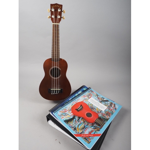 217 - A Makala ukulele, in case with instruction manuals