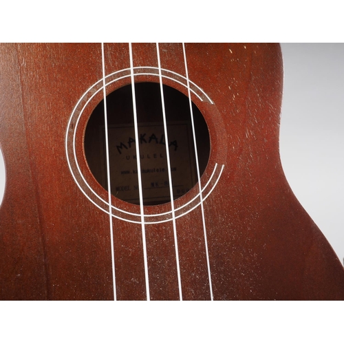 217 - A Makala ukulele, in case with instruction manuals