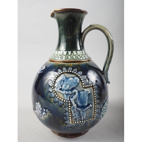 24 - A Doulton Burslem jug with relief bird and tree decoration, 8