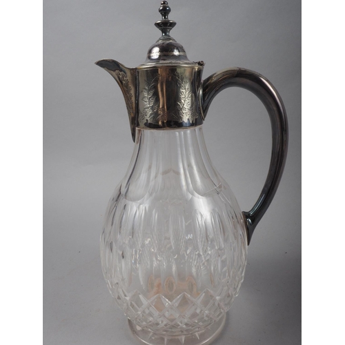 262 - A cut glass and silver plate mounted claret jug, 10 1/2