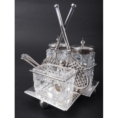 263 - A silver plated cruet set with handle formed as a tennis racket